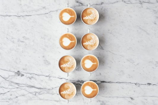 mugs of coffee in a row