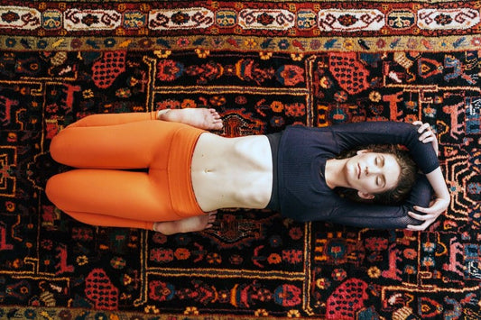 woman stretching for gut health woman stretching for gut health