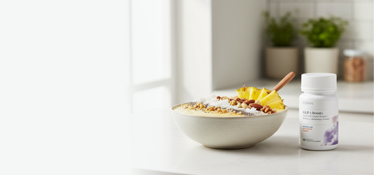 Bowl of cereal with yogurt and fruit on a kitchen counter next to a bottle of G.L.P. Extend. Bowl of cereal with yogurt and fruit on a kitchen counter next to a bottle of G.L.P. Extend.