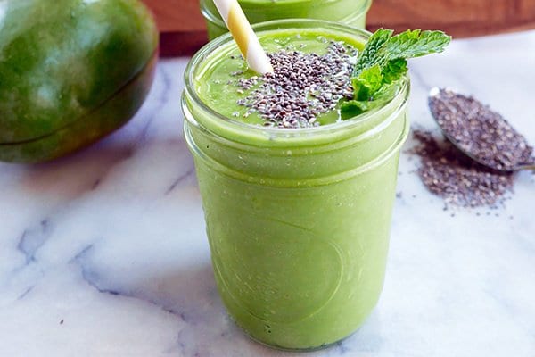 Sweet Mango Smoothie With Greens To Get Your Day Going!