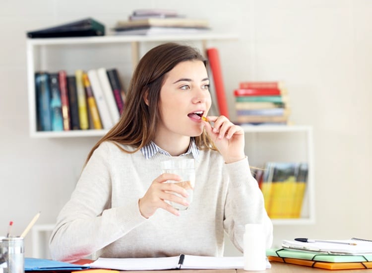 Women taking probiotics