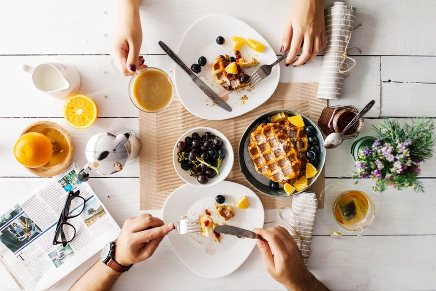 People eating breakfast at a table