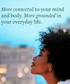 Woman's side profile against a city background with the text: "More connected to your mind and body. More grounded in your everyday life."