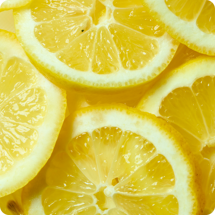 Close-up of sliced lemons with a bright yellow color.
