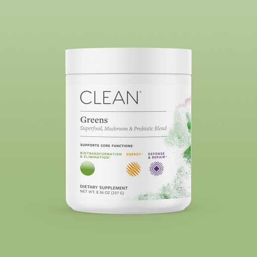 Supplement container labeled 'Clean Greens' on a green background