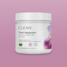 Container of CLEAN Total Magnesium supplement on a pink background