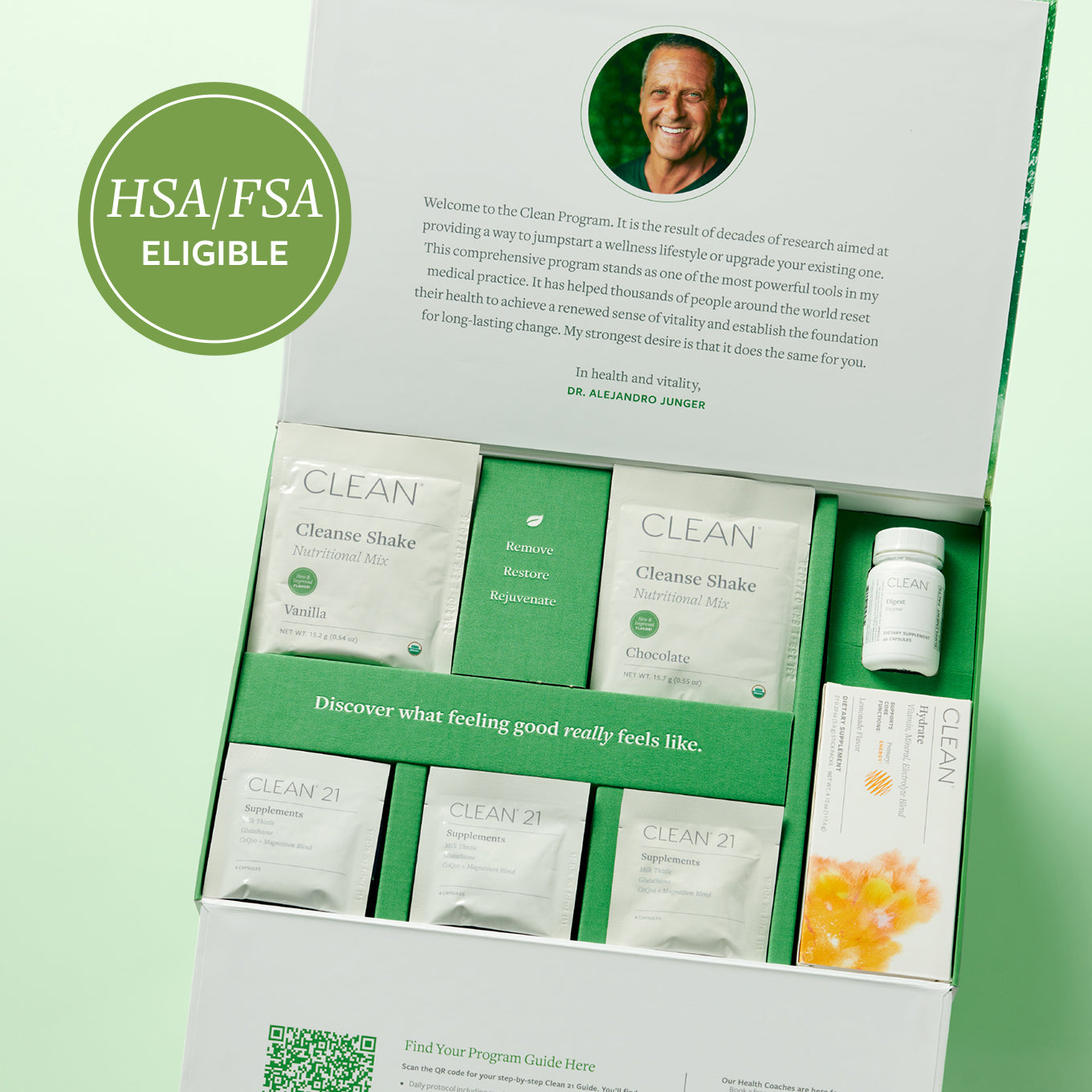 Clean 21 program kit open box with HSA/FSA Eligible badge, welcome letter from Dr. Alejandro Junger, Cleanse Shake vanilla and chocolate packets, and Clean 21 Supplements