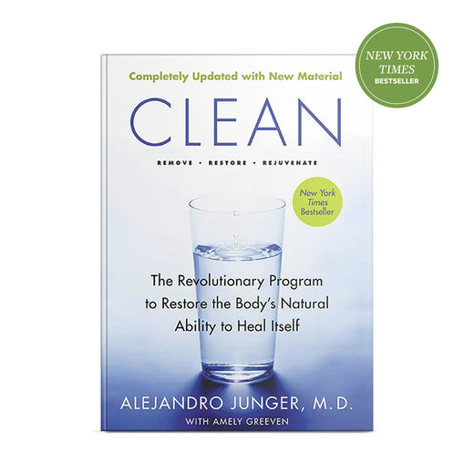 Book cover of 'Clean' by Alejandro Junger with a glass of water on a white background