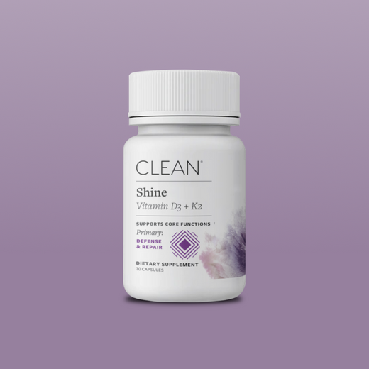 Shine Supplement bottle labeled 'Clean' on a purple background
